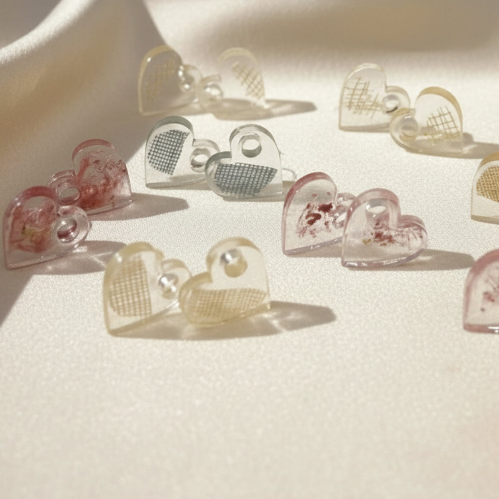 Détail Pampilles Cœur Douceur 2cm - Résine UV couleurs pastel romantiques avec inclusions délicates
