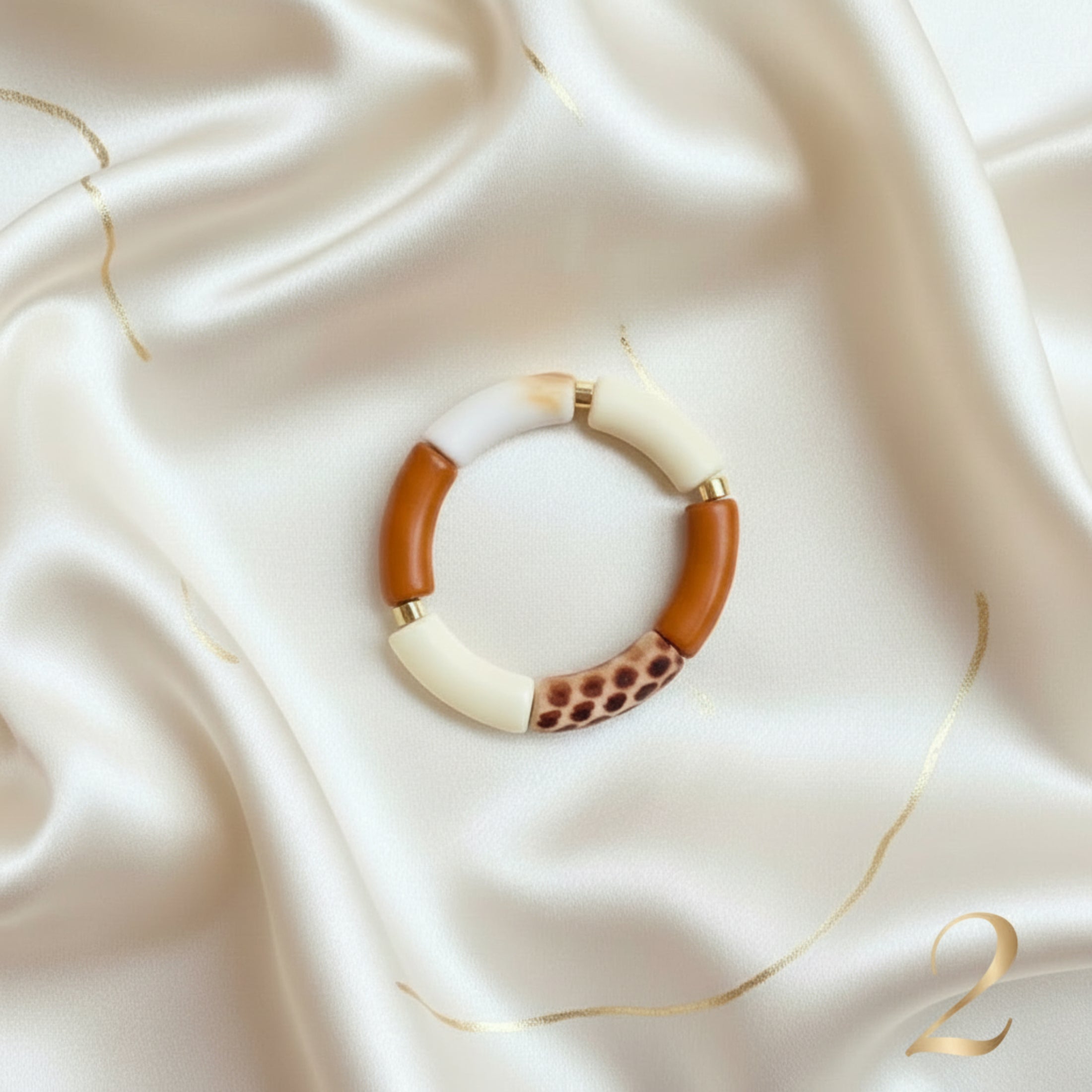 Bracelet Tendance ÔParis Modèle 2 - Perles tube léopard et dorées

