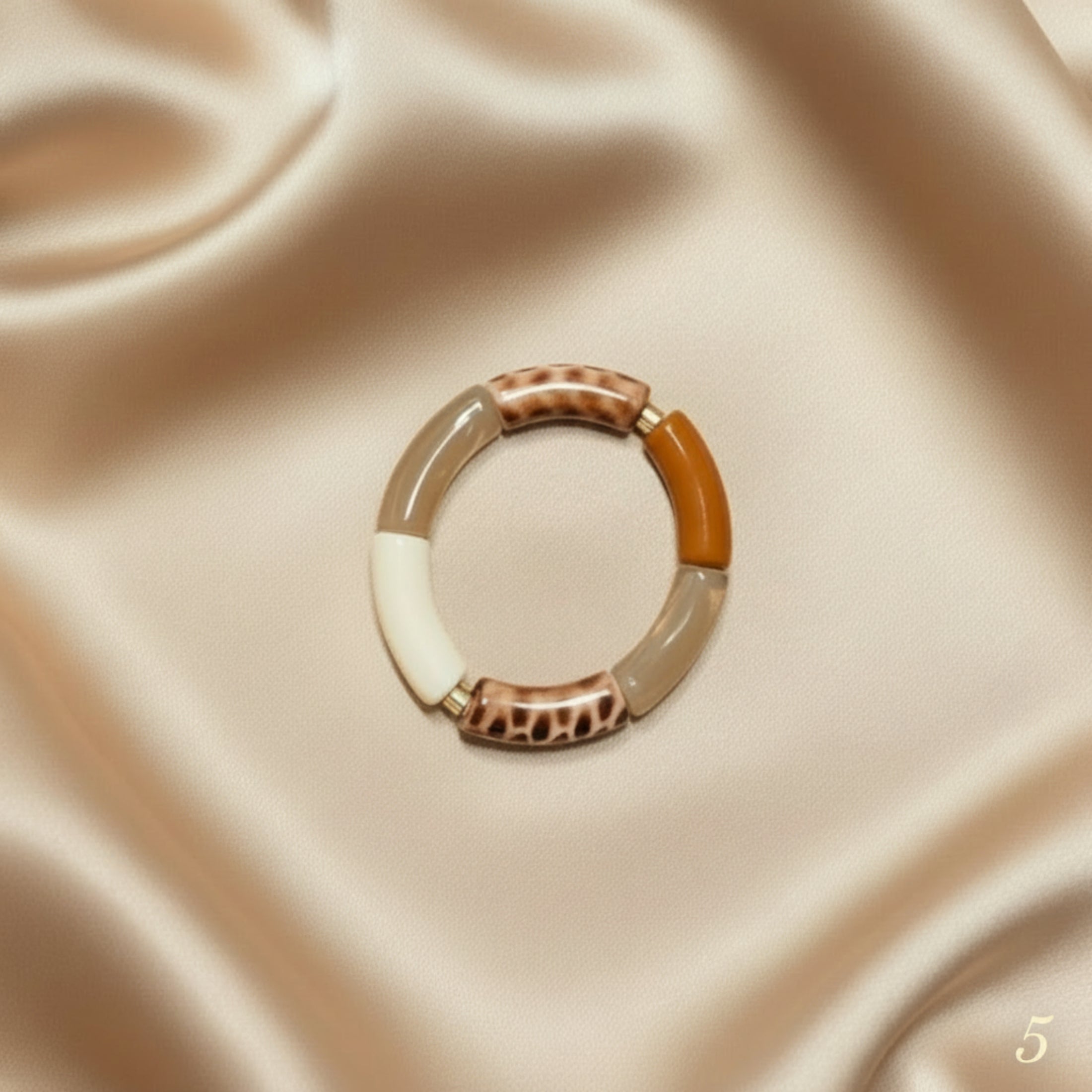 Bracelet Tendance ÔParis Modèle 5 - Perles tube léopard et dorées
