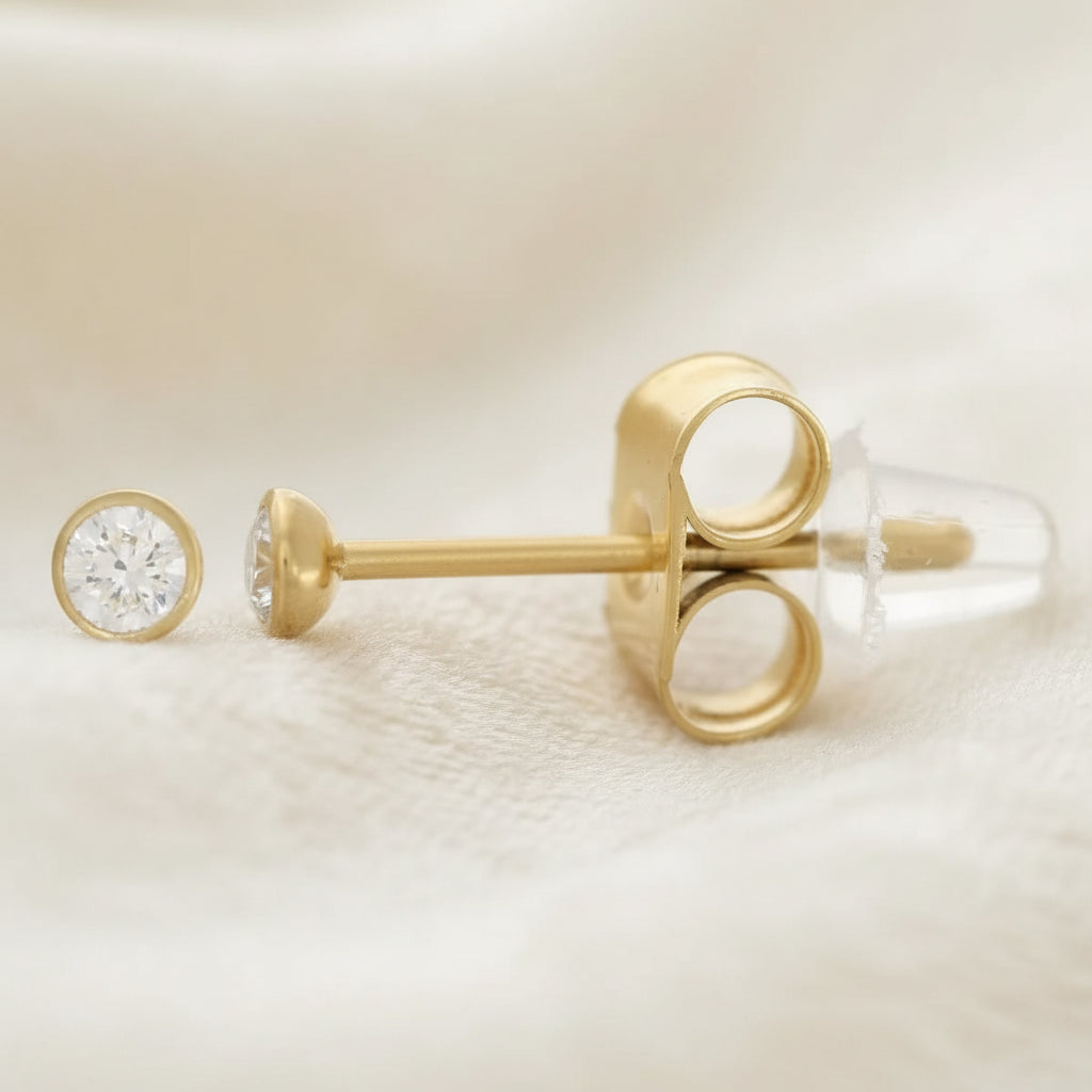 Puces d'oreilles rondes zirconium 2,5mm acier inoxydable doré